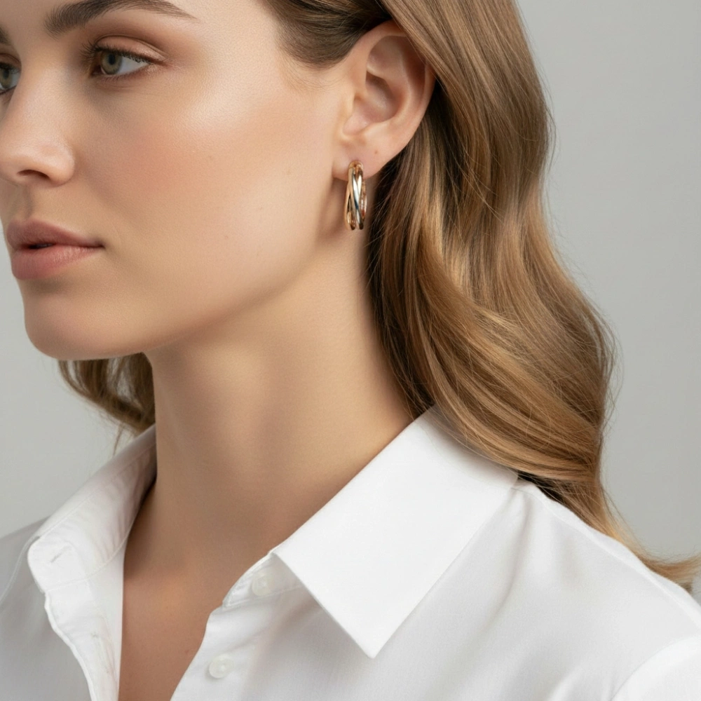 Boucles d'oreilles Créoles Entrelacées 6.7mm x 26mm 3 Ors 375