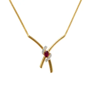 Collier Maille en or jaune, rubis et diamants