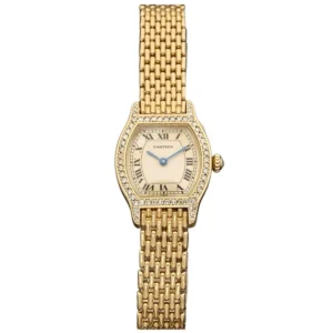 Montre CARTIER Tortue en or jaune, acier et diamants .....