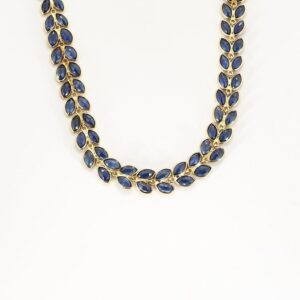 Collier rivière à motif de feuilles en or jaune et saphirs