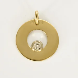 Pendentif rond ajourée en or jaune, or blanc et diamant